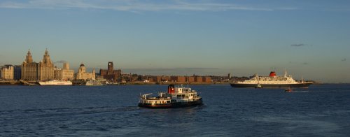 B107-045 Liverpool UNESCO World Heritage Site Maybe in anticipation of things to come the Linners start visiting but have to anchor mid river as there are no fascilities for berthing Guy Woodland 1989-2011